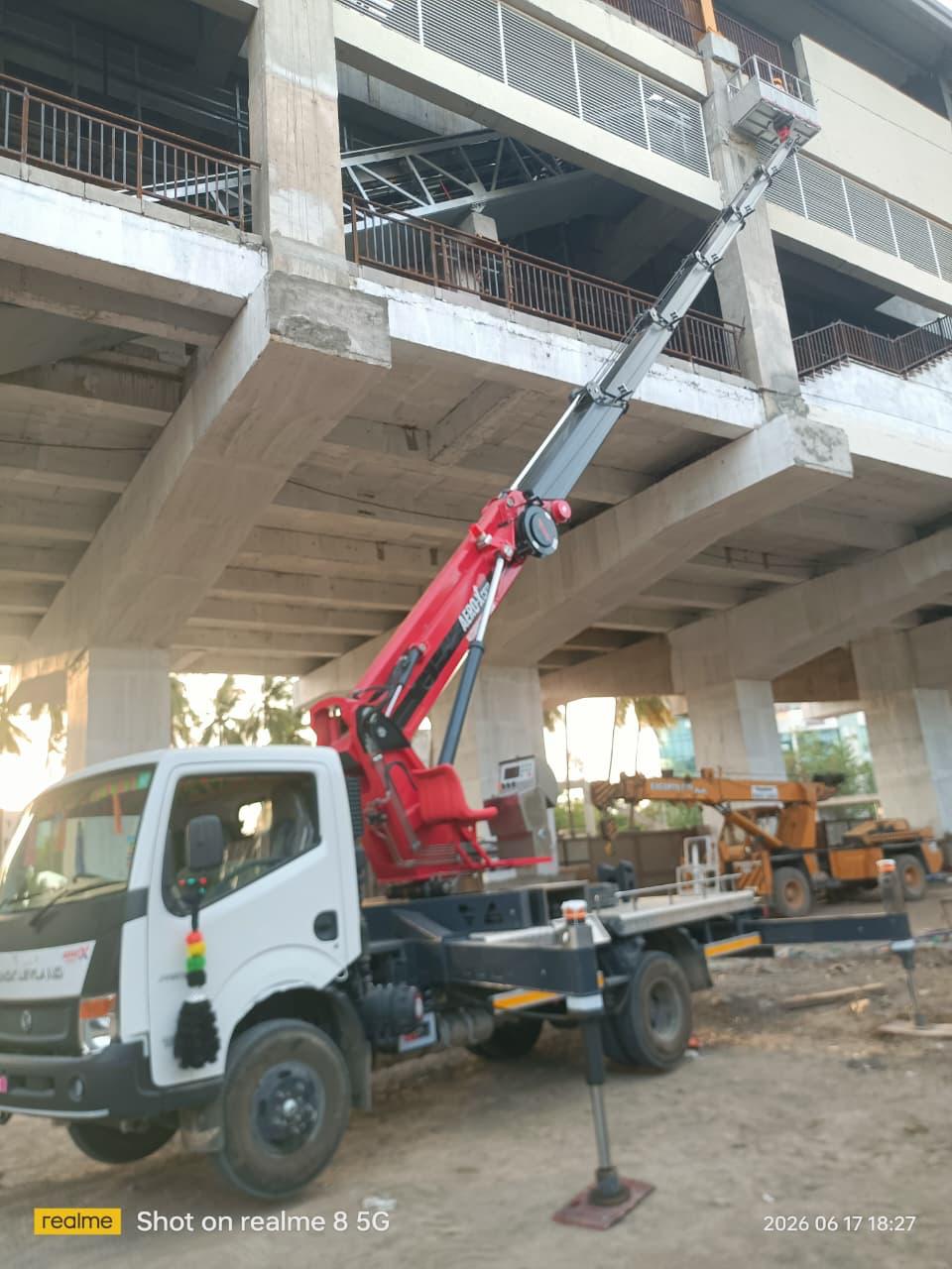Boom lift at construction site in Surat