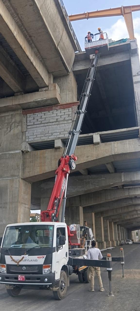 Vidhistutya truck mounted boom lift at Surat Metro viaduct project